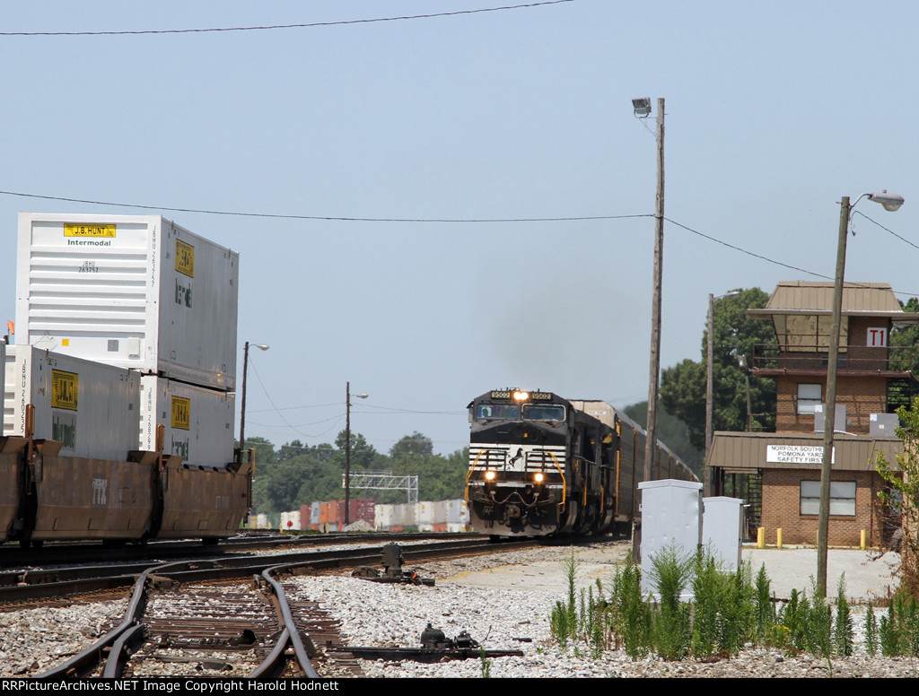 NS 9502 leads train 214 past Pomona tower